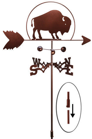 A  metal weathervane featuring a buffalo design atop directional letters, with garden pole.