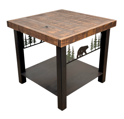 Square End Table with a Rugged Pine Tree and Bear design. The top features a rough sawn wood top with a solid metal shelf towards the bottom of the table.