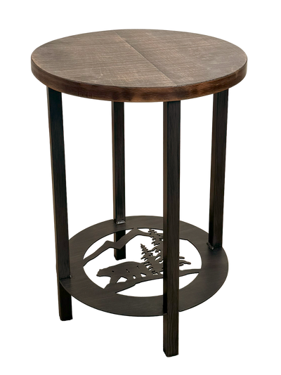 Round metal bear with pine tree design end table with a rough sawn wood top.
