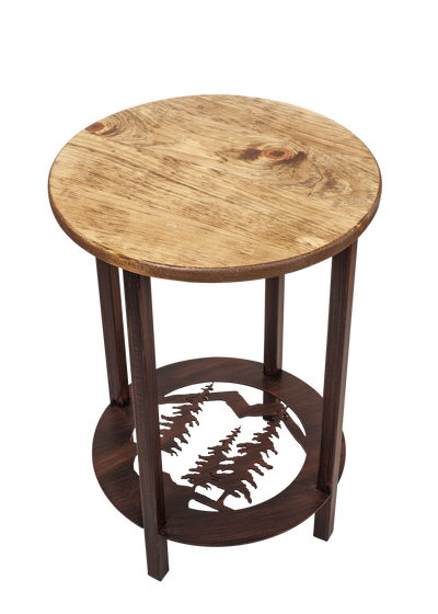 Round pine tree design metal end table with a wood top.