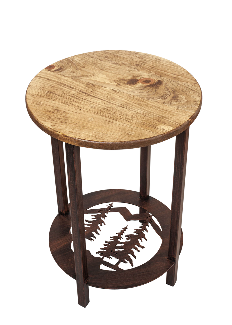 Round pine tree design metal end table with a wood top.