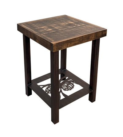 Square end table with metal legs and rough sawn wood top. The base features a pine cone accent perfect for your rustic family room or outdoor patio.