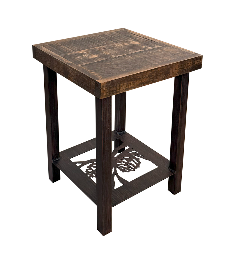 Square end table with metal legs and rough sawn wood top. The base features a pine cone accent perfect for your rustic family room or outdoor patio.