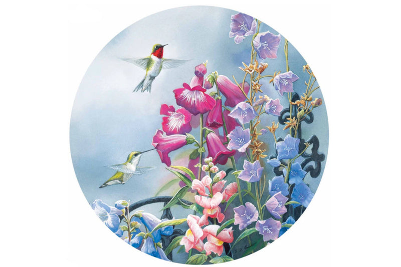 Round painting of colorful flowers and hummingbirds on a white background