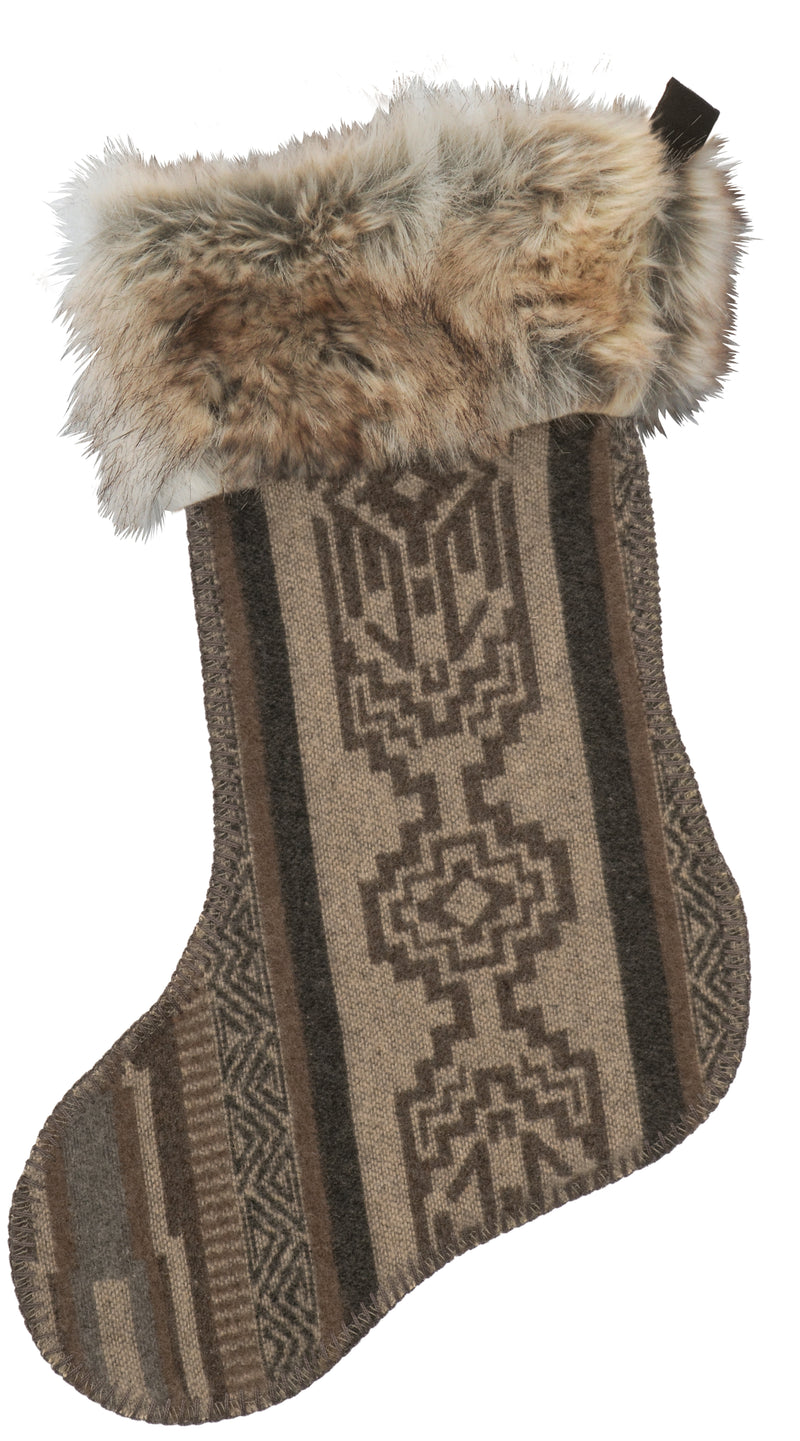 Decorative Christmas stocking with fur trim on a white background